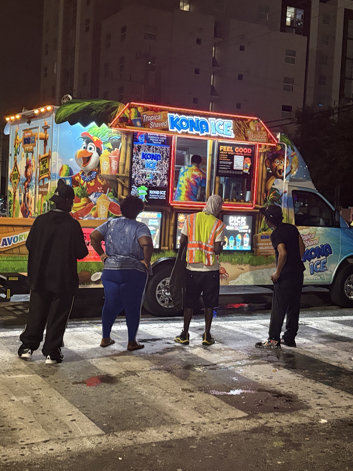 Customers visiting Kona Ice outside JAM Arena